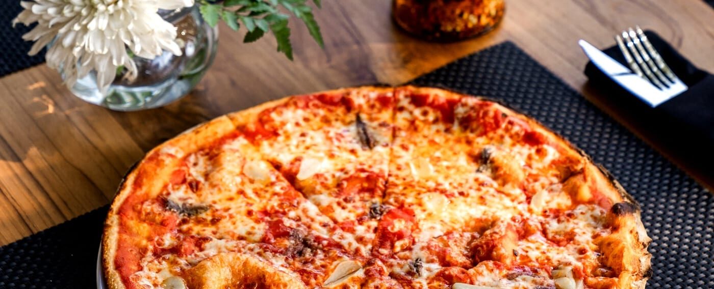 Woodfire pizza, fresh pasta, finished at your table